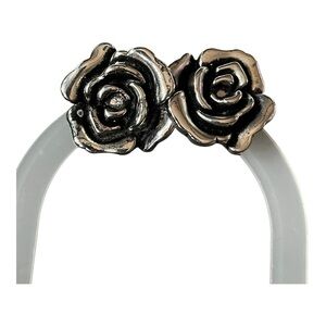 Beautiful silver toned rose stud earrings